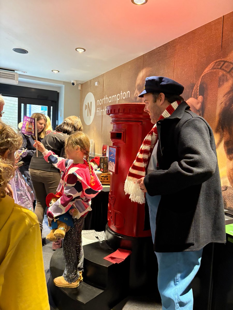 RoyalDerngate's tweet photo. Flashback to the Mayor Joyce's Family Gala Screening of Paddington in Peru in support of @uk_tlf
at @nnfilmhouse - where our very own Jolly Postman popped in to pick up everyone's letters to Father Christmas! https://t.co/V86HhYQXGU