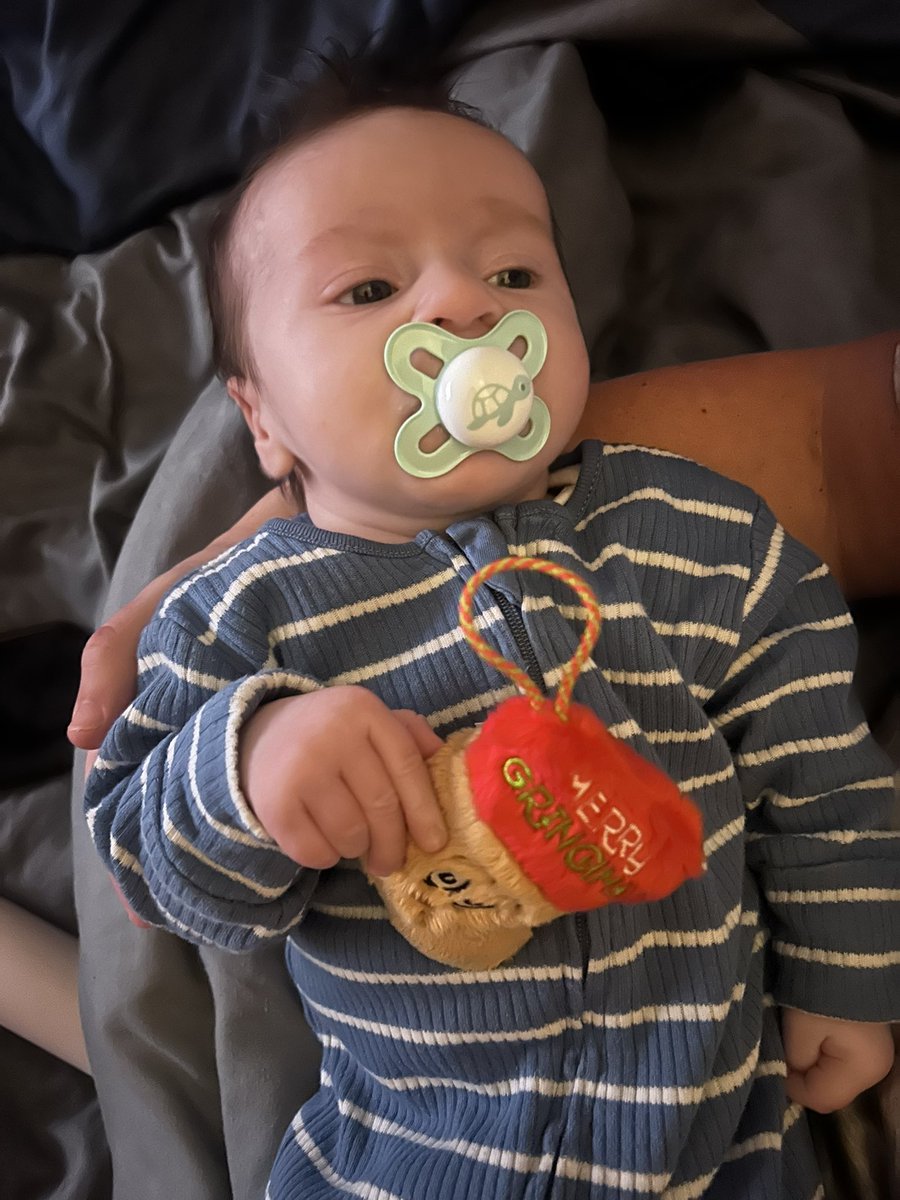 kbuckley87's tweet photo. @McDonaldsUK our son Jesse-James loves your new Grinch Happy Meal toy! Only 6 weeks old! https://t.co/USnZ5gLYrz