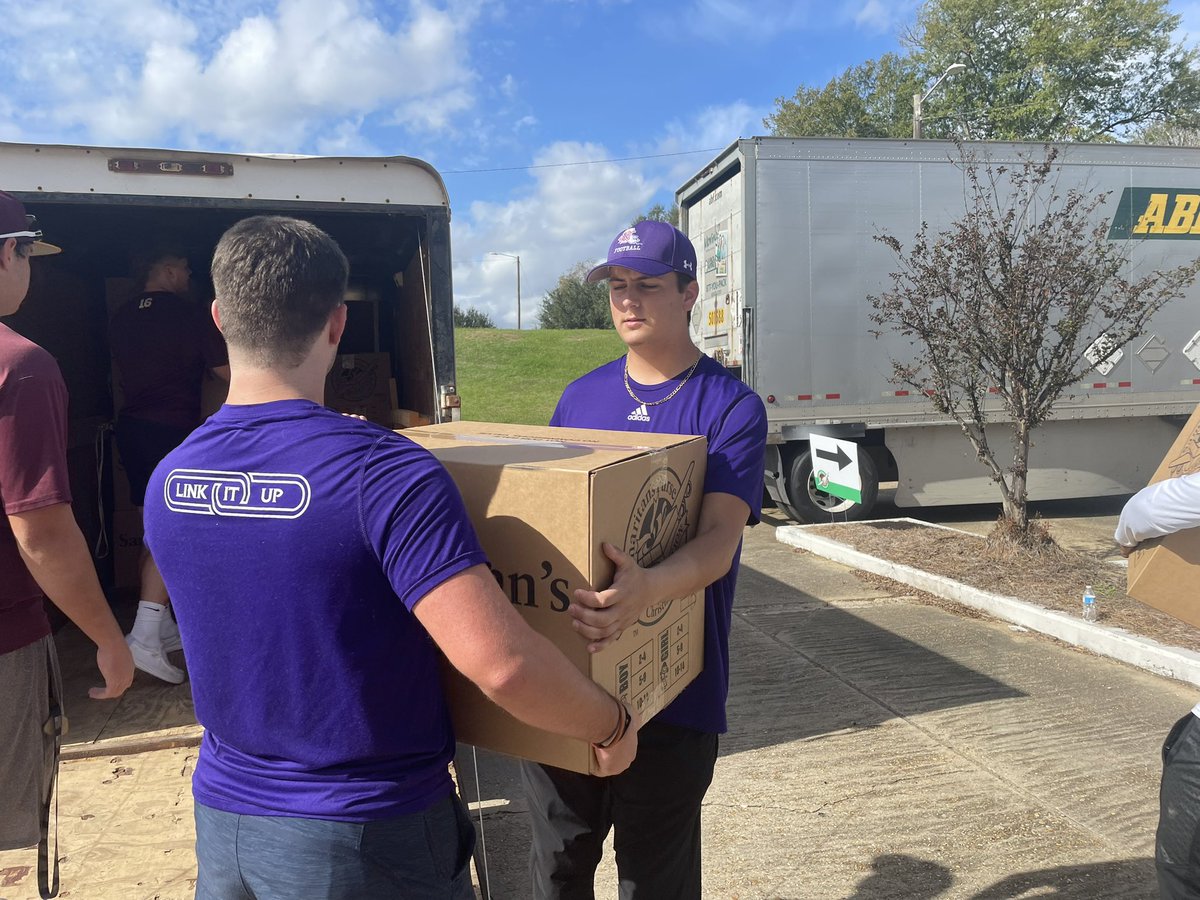 NSUDemonsFB's tweet photo. Handoffs, holiday style. Our guys were happy to get #Nvolved and help load up gifts collected for Operation Christmas Child.
#ForkEm x #BlaineTrain https://t.co/G6HlX34x3b