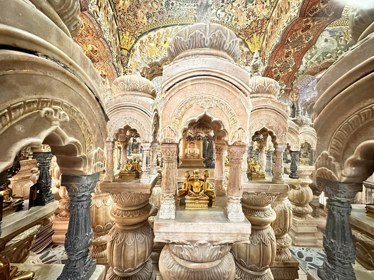 In Jainism, Mount Meru is a sacred cosmic mountain considered to be the center of the Jain universe. It is depicted as a colossal mountain with three distinct parts, each representing different realms of existence. 
Mount Meru is symbolic of spiritual heights, cosmic order, and