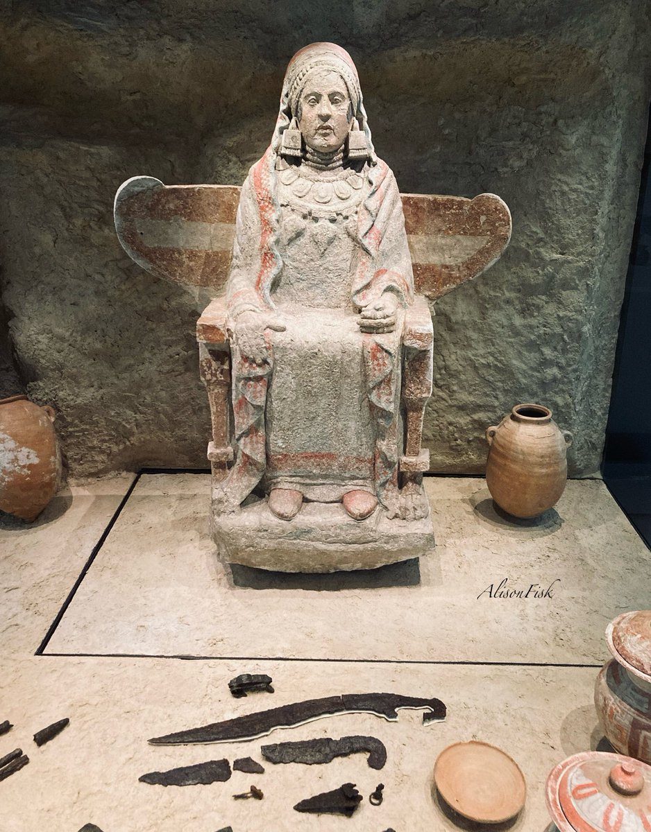 AlisonFisk's tweet photo. The Lady of Baza. A remarkable cremation urn from the Iberian Iron Age. Painted limestone, 4th century BC. 

Found inside an underground chamber in 1971 during excavations of the Baza Sanctuary necropolis, Granada, Spain.

Luxury pottery and metal weapons were placed as funerary offerings at the feet of the statue.

Statue height: 133.50 cm (approx 4ft 4inches) 

Tomb reconstruction at the Museo Arqueológico Nacional, Madrid. 📷 by me

Read more: https://t.co/9qINDeR02k

#TombTuesday
#Archaeology