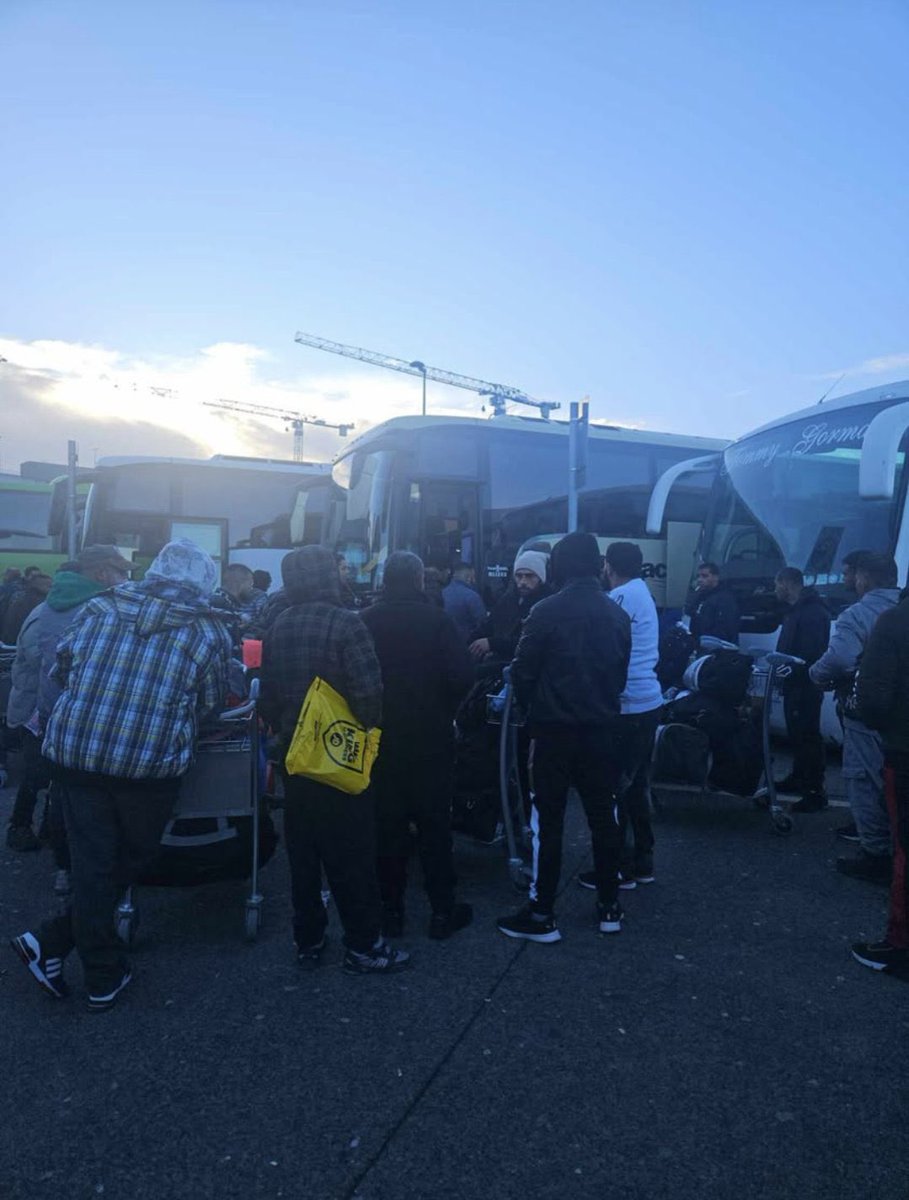 TheLiberal_ie's tweet photo. “We are being invaded” 🇮🇪
📍Dublin Airport, Sunday 9:30am
200 male-only migrants being loaded onto four private coaches.
They came from the airport terminal and were ushered onto private buses by officials in hi-vis jackets. #IrelandisFull 
Follow us for video updates and share https://t.co/kJPzbvD4P8