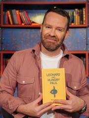 Bluemoose Books (@ofmooseandmen) on Twitter photo Congratulations @MumblinDeafRo
_Leonard and Hungry Paul_ has been chosen by
Irish comedian Neil Delamere as his favourite book and
Will chatting about it tonight on #BetweenTheCovers @BBC2 at 7pm
<a href="/BBCRadio4/">BBC Radio 4</a>
<a href="/thebookseller/">The Bookseller</a>
<a href="/BAbooksellers/">Booksellers Association</a>
<a href="/WaterstonesPicc/">Waterstones Piccadilly, London</a>
<a href="/Foyles/">Foyles Bookshop</a> Congratulations @MumblinDeafRo
_Leonard and Hungry Paul_ has been chosen by
Irish comedian Neil Delamere as his favourite book and
Will chatting about it tonight on #BetweenTheCovers @BBC2 at 7pm
<a href="/BBCRadio4/">BBC Radio 4</a>
<a href="/thebookseller/">The Bookseller</a>
<a href="/BAbooksellers/">Booksellers Association</a>
<a href="/WaterstonesPicc/">Waterstones Piccadilly, London</a>
<a href="/Foyles/">Foyles Bookshop</a>