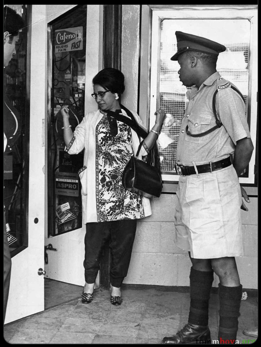 Ngartia's tweet photo. These pictures are 55 years apart.

In the first, Mohini Kaur Sehmi speaks to a police officer outside Channi's Pharmacy — her establishment. Right after Tom Mboya was shot as they were talking.

In the second one, she's with Chandni Vaya, who plays Mohini in #TEFBMboya. https://t.co/pe1kFf34HW