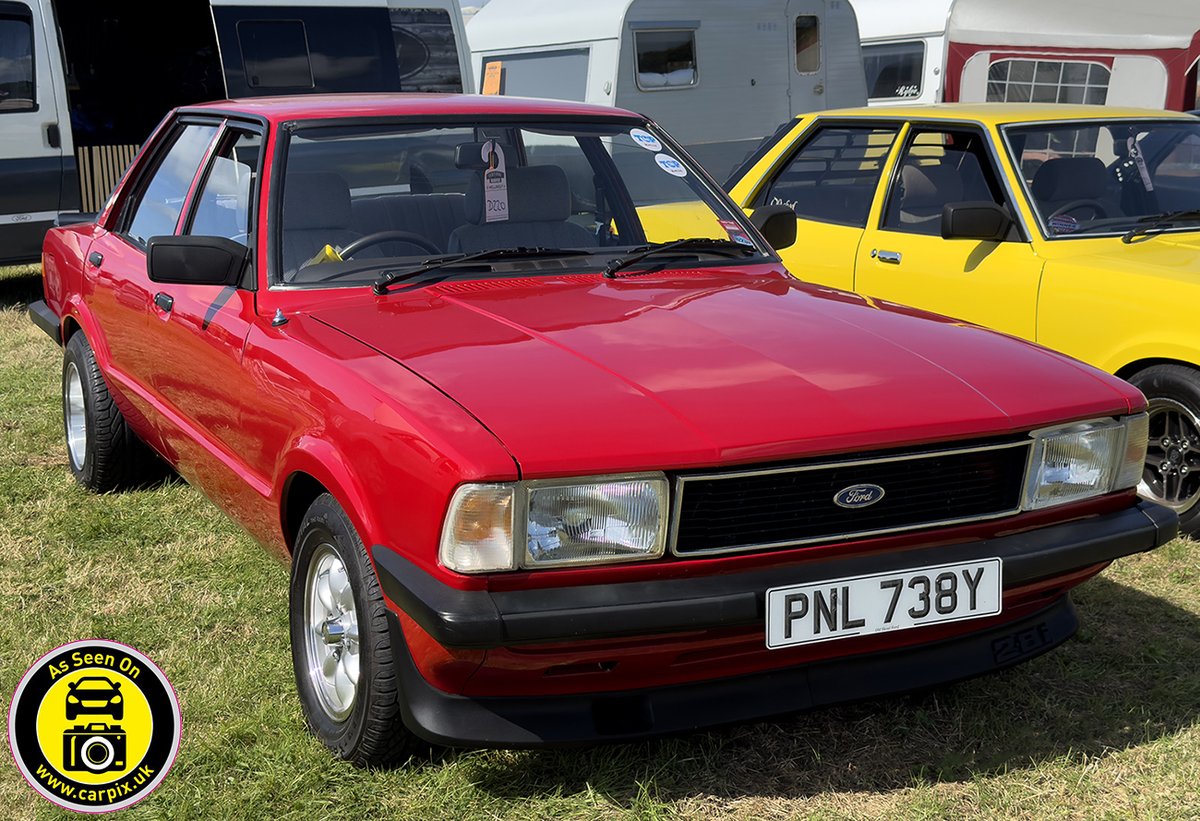 evo_uk's tweet photo. A fantastic selection of #RetroFord cars at the 2024 Festival of Transport #Hellingly, including the #FordEscort  #FordCortina #FordOrion and #FordCapri. https://t.co/ApIxnlOe9P