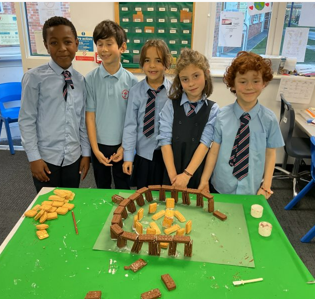 StVincentsPr's tweet photo. Year 3 did a History/DT lesson thinking about how Stonehenge was constructed. They build it using biscuits! #enrichment #DT #passionateaboutlearning https://t.co/BJRD5F5ucM