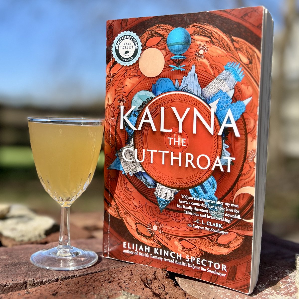 Elias Eells- Bar Cart Bookshelf (@eliaseells) on Twitter photo NEW VIDEO ALERT! Today on Bar Cart Bookshelf we’re talking about KALYNA THE CUTTHROAT by Elijah Kinch Spector. Fast-paced erudite adventure fantasy for the cleverest and queerest of us. Our drink, Radiant Basket of Rainbow Shells, would delight a Loashti scholar and you as well! NEW VIDEO ALERT! Today on Bar Cart Bookshelf we’re talking about KALYNA THE CUTTHROAT by Elijah Kinch Spector. Fast-paced erudite adventure fantasy for the cleverest and queerest of us. Our drink, Radiant Basket of Rainbow Shells, would delight a Loashti scholar and you as well!