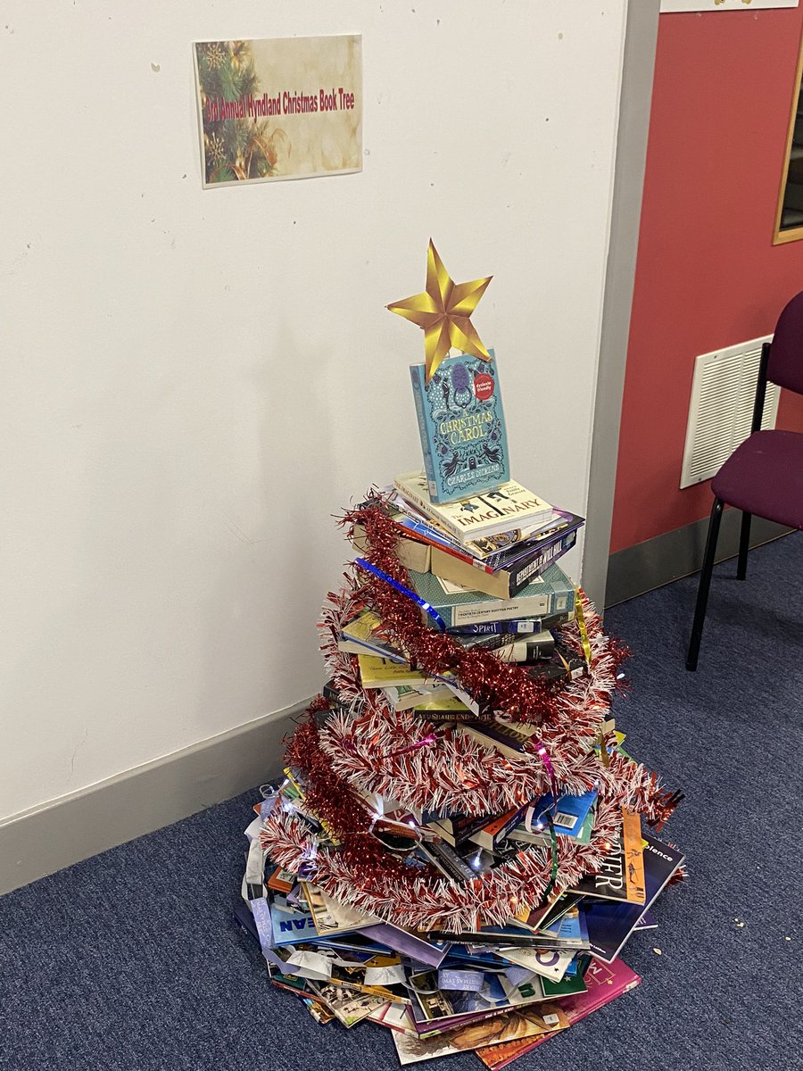 HyndlandL's tweet photo. The 3rd Annual @HyndlandSec Christmas Book Tree has been created. It’s taller than last year..and straighter. A spirit level was used this year 😆 Well done team. 3rd times a charm 🎄@HyndlandEnglish #readingschool #booktree https://t.co/lBITvW01DY