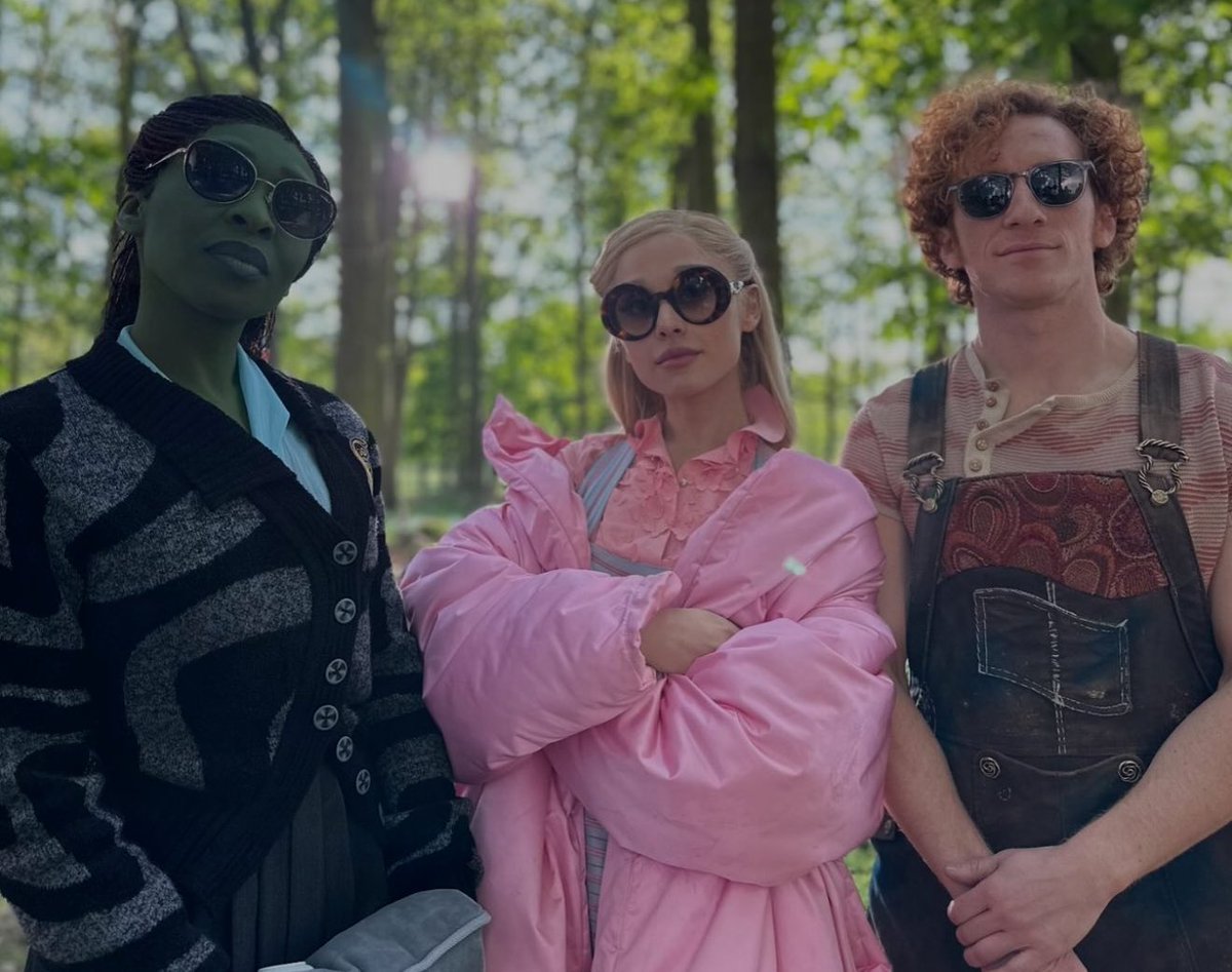 Cynthia Erivo, Ariana Grande and Ethan Slater on the set of Wicked.