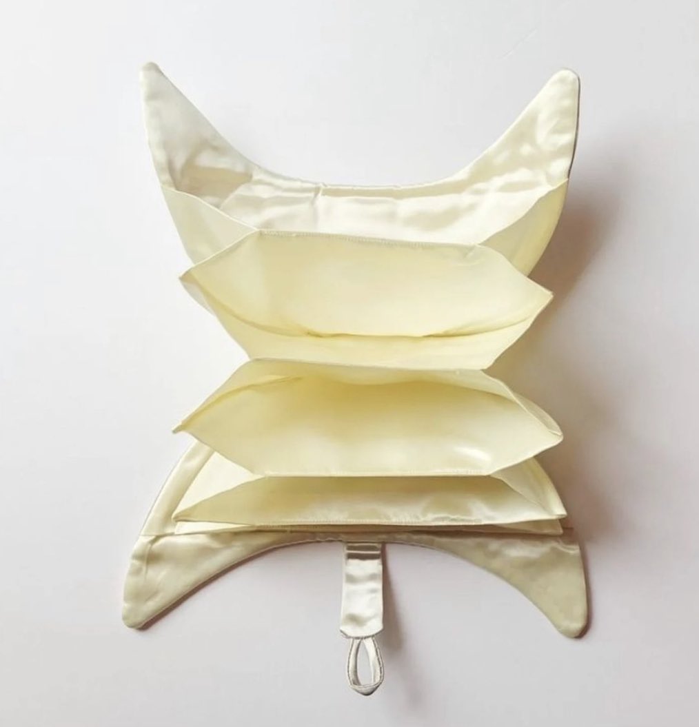 Crescent moon purse made by Christian Dior, 1950s