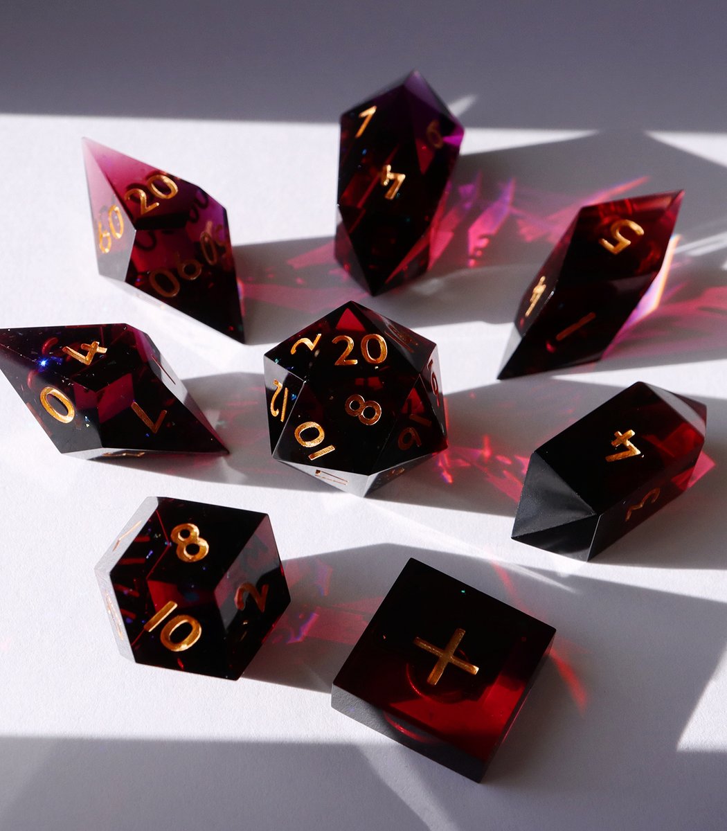 EVERYTHINGDICE's tweet photo. Ruby Tears 🩸A dark black crystal set that shines a lush pomegranate red under the light. Dropping this Friday, 11/29 🍷 #dnd #dice #ttrpg https://t.co/rGqf6SxeH5