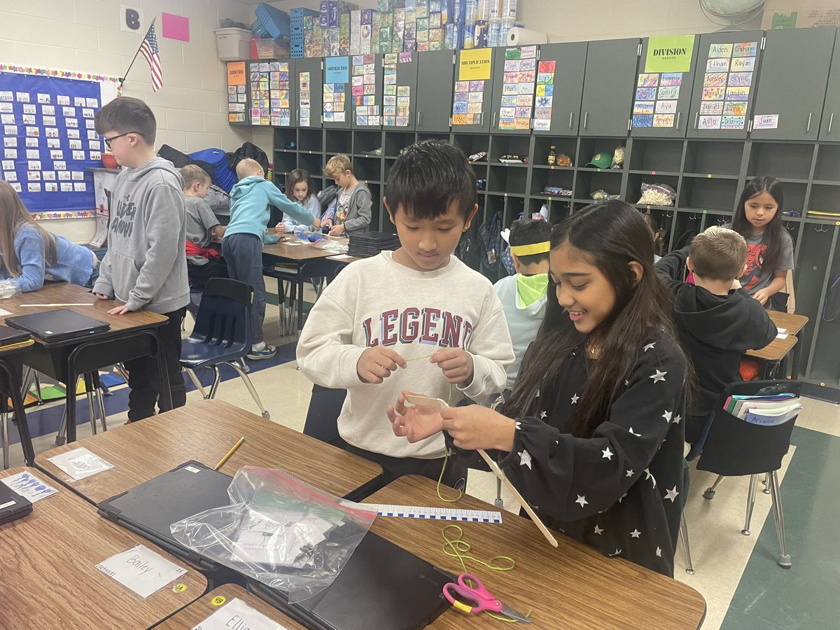 mrsosterman's tweet photo. STEM activity today!  Table groups worked together to make fishing poles with popsicle sticks, string, and paper clips! https://t.co/obhqFBC9kY