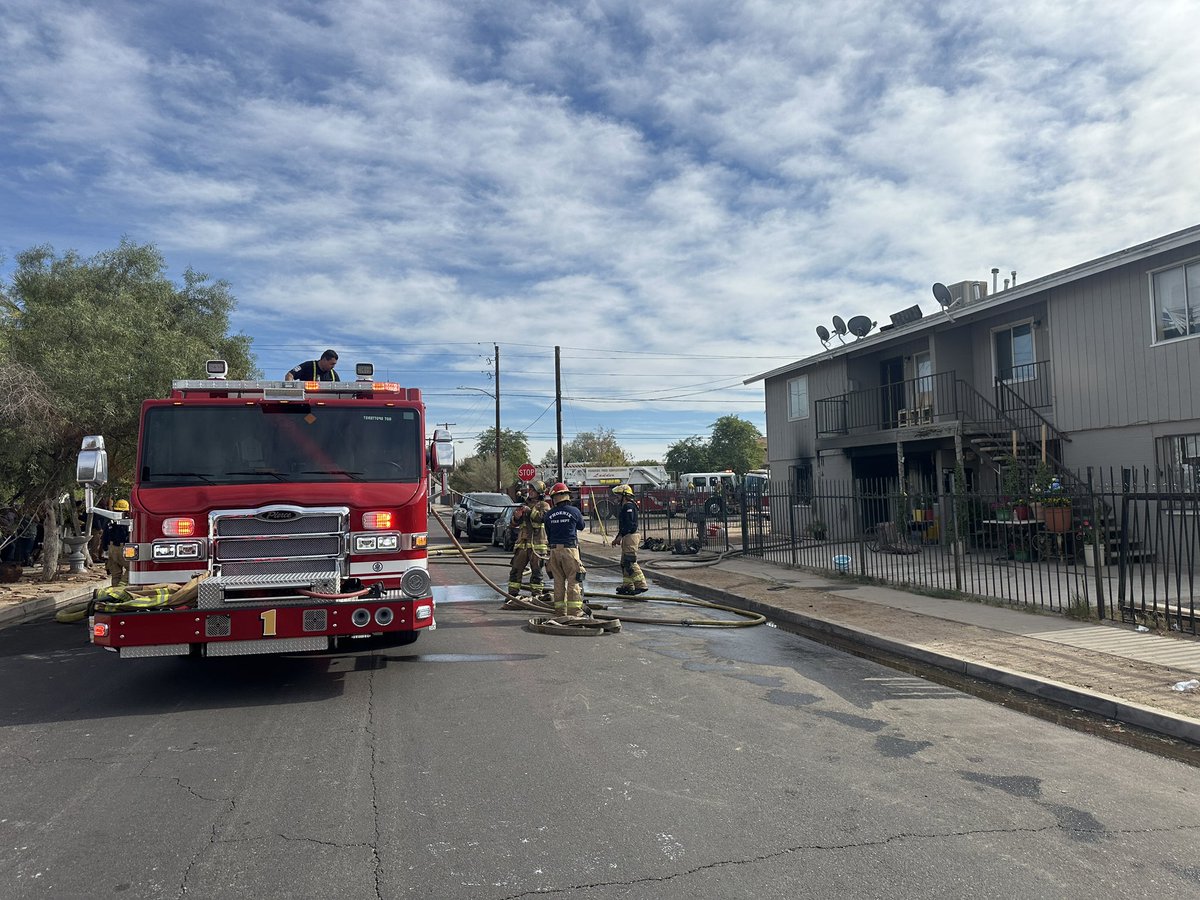 PHXFire's tweet photo. #PHXFire rescued a dog from one of the involved units and reunited him safely with the owner. The community assistance program will be working with the displaced occupants to secure temporary shelter. The cause of the fire is under investigation. https://t.co/OEYZpcLMoQ