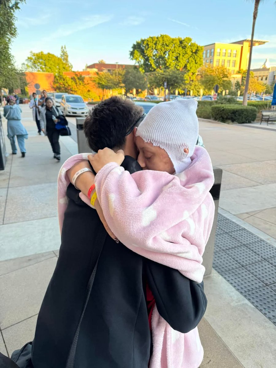 KristyTallman's tweet photo. ALEXIS LORENZE UPDATE ⚠️ Todd Lorenze shared: "My ex flew out from Florida with my son to visit Alexis Lorenze and for my birthday. It was a nice 2 days having my son here."

Family remains united as Alexis continues her recovery journey.

As of November 26, 2024, Alexis Lorenze continues her recovery journey following severe reactions to vaccines administered earlier this year. Her father, Todd Lorenze, shared a personal update, mentioning that his ex-partner traveled from Florida with their son to visit Alexis and celebrate his birthday. He described the two-day visit as a pleasant experience, highlighting the family's efforts to support Alexis during this challenging time.

Alexis, a 23-year-old from Florida, was diagnosed with Paroxysmal Nocturnal Hemoglobinuria (PNH) in January 2024. In September, she received Tetanus, Pneumococcal, and Meningitis vaccines against her will at a California hospital, after which she experienced severe adverse reactions, including temporary blindness, locked jaw, and vomiting. These events led to her hospitalization and a prolonged recovery process that includes burn treatment and many surgeries. Problems she was never faced with until they forced their poisons in her. They literally denied her the treatment she showed up for until she took the vaccines- the hospitals are the gatekeepers to your death..big pharma has made it so..

The family's recent reunion underscores their ongoing commitment to Alexis's well-being as she continues to recover.

#AlexisLorenze #RecoveryJourney #FamilySupport #ToddLorenze #HealthUpdate #VaccineReaction #StayStrong