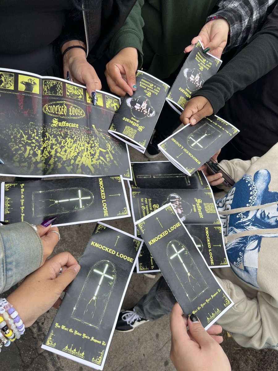 T0UGHXL0VE's tweet image. guy in a suit is walking past the knocked loose line handing these out saying “please consider joining us in hardcore”