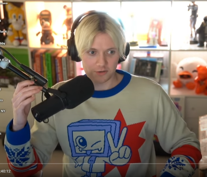 pk_kenzie's tweet photo. i designed @Pyrocynical new christmas jumper and beanie but he didnt send me pictures of it so i have to screenshot. i dont know what the orange thing is im sorry but that is not a part of it. its on his merch store pls buy it thank u https://t.co/CdSBYCP6rQ