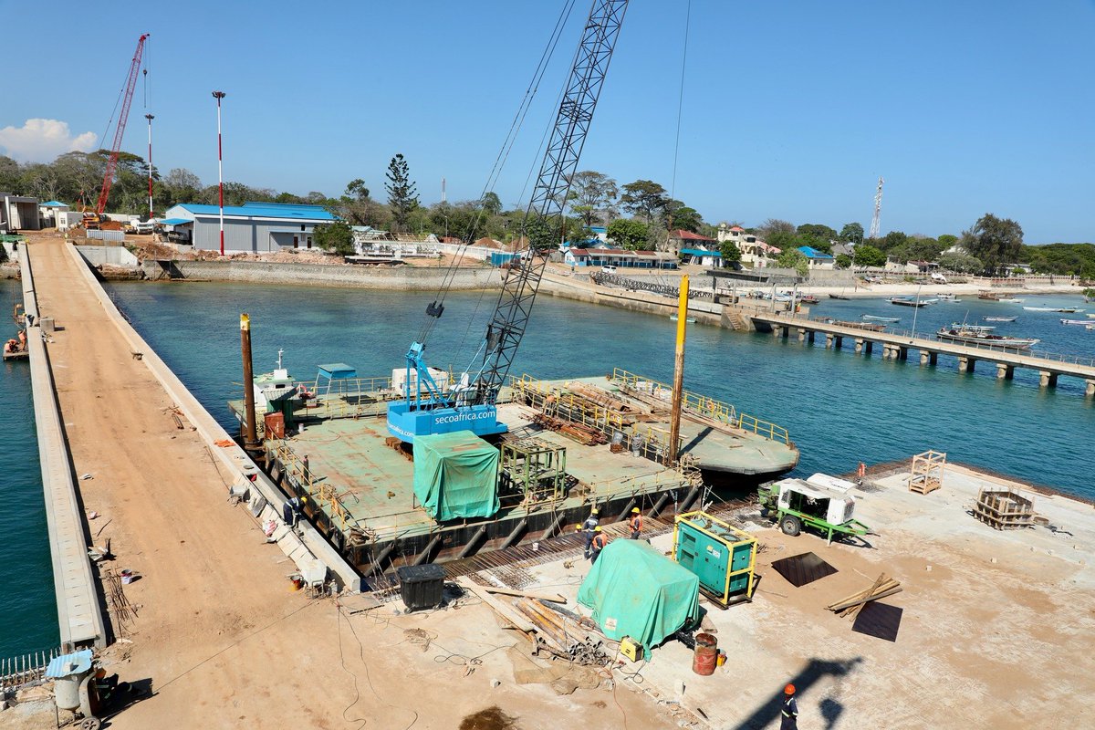 Kenya_Ports's tweet photo. The on-going construction of Ksh.2.6 billion Shimoni Fish Port by the Kenya Ports Authority has achieved an overall completion rate of 84.7 percent.

This is the first fish Port in the region and is expected to harness the potential of the Blue Economy by significantly enhancing fish production, processing, and value addition, both locally and for the export market.

Construction of the modern jetty measuring 75 meters by 30 meters, along with a causeway spanning 135 meters in length and 7 meters in width is 92 percent complete. The modern facility has a dedicated warehouse which will serve as a fish processing plant.

Additionally, other features under construction include a fish market, cold storage facilities, reefer stations, power substation, an ice-making plant, a bio-digester, and waste-water management and a perimeter fence.
@TransportKE 
@SDoT_Kenya