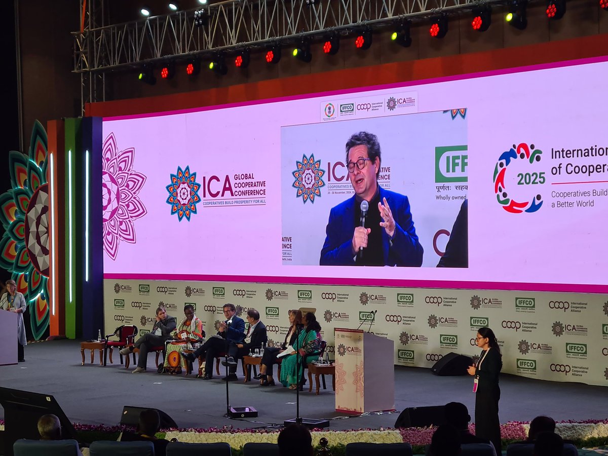 Prof. Trebor Schultz of <a href="/PCC_Global/">Platform Cooperativism Consortium - Global</a> on stage talking about the growth of #Platform #Cooperative Projects around the world. Showing that a co-op alternative is possible. #ICANewDelhi2024