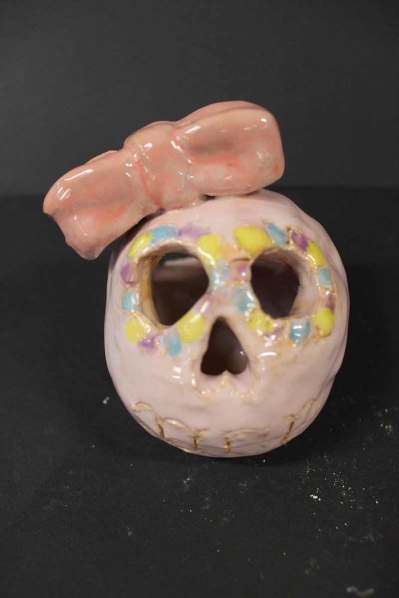 💀 Day of the Dead 💀 

Year 8 glazed ceramic day of the dead skulls are out of the kiln and looking amazing. Pinch pot technique adapted to create little tea light holders. Watch out parents these could find their way under the tree as gifts this year!