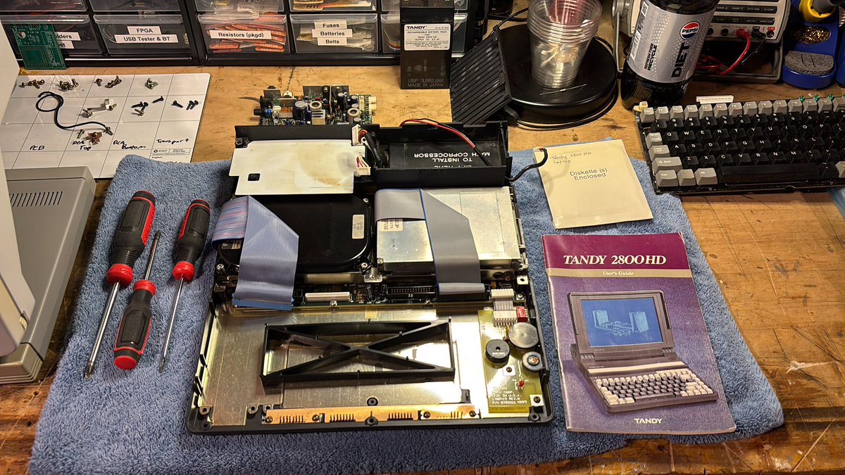 The Tandy 2800 HD has a full-size 3.5” hard drive in it.  Full-size floppy, too!  I guess that helps explain this thing’s heft.  At least the drive is AT-IDE.