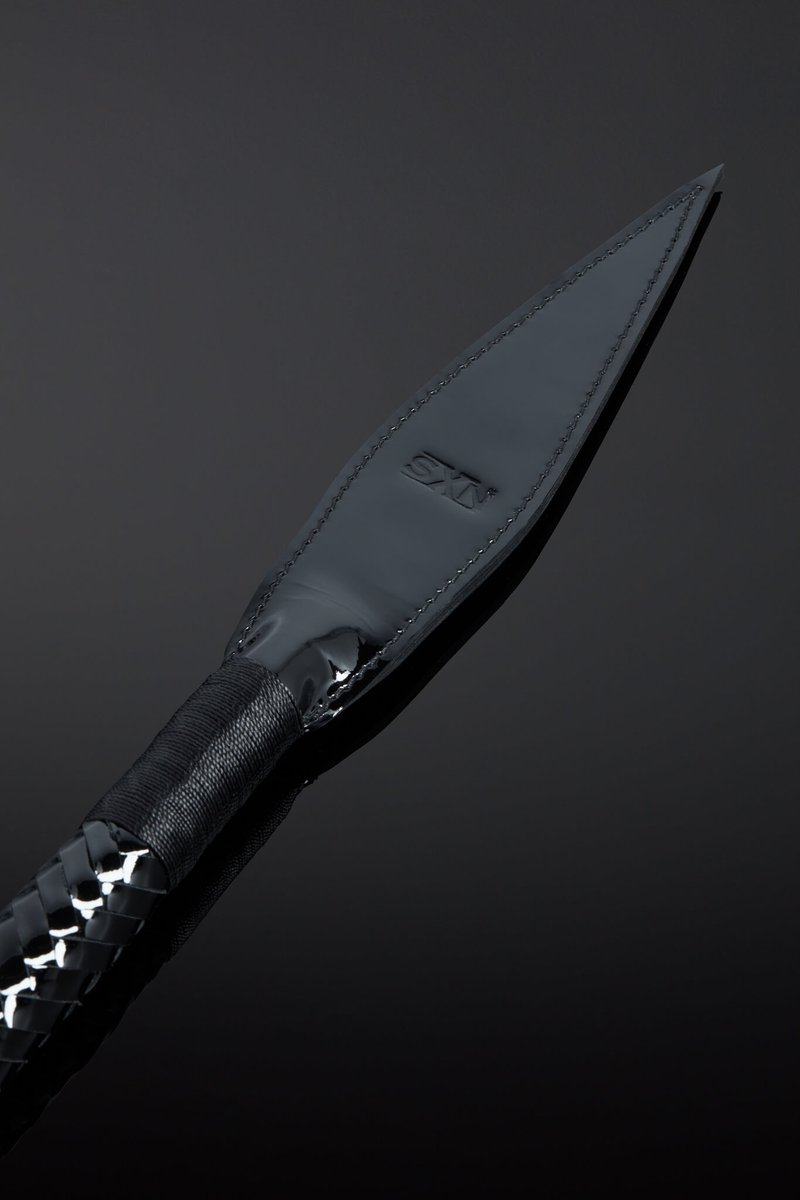 Houseofsxn's tweet image. The Brutalis Tail stands as a symbol of our dedication to superior craftsmanship and design.  With its sleek black patent exterior lies a flexible rubber core,  ensuring a satisfying impact with each swing.  #visualappeal #blackpatent #craftsmanship #impact #handcrafted