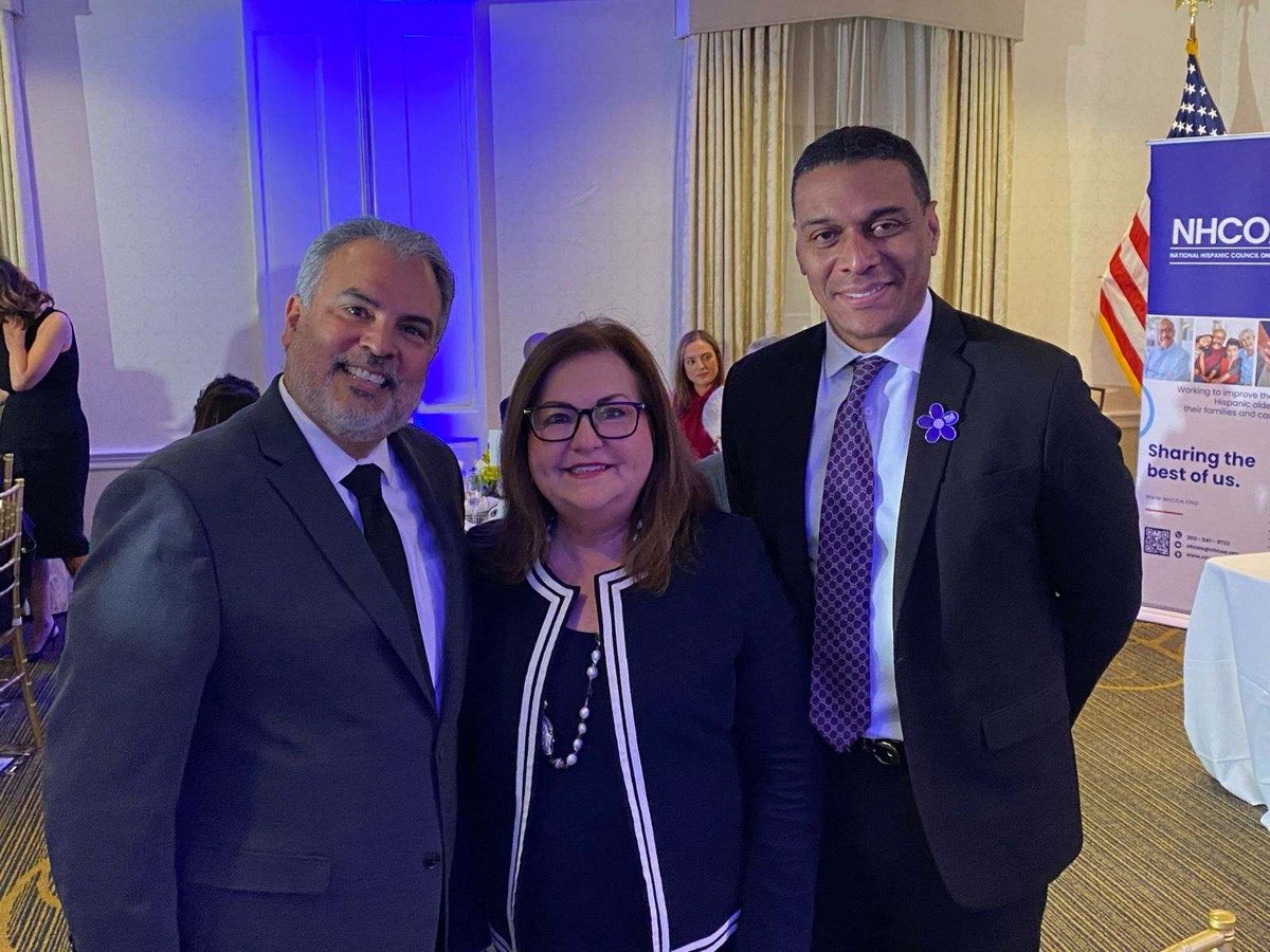 Carl Hill, PhD, and Rigo Saborio, MSG, congratulating Dr. Maria Aranda on her 2024 research award from the National Hispanic Council on Aging