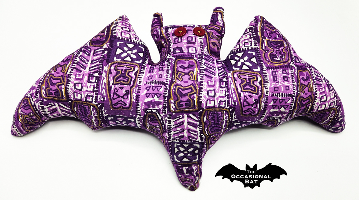 OccasionalBat's tweet photo. The colors really pop and give off such a vibrant energy. 🌟 #bat #handmade #pillow #SALE #purple #gold #tribal #theoccasionalbat #etsy #shopsmall #gift 💜💛💜 https://t.co/egwZNT4s3p https://t.co/XLG5iwlWgG