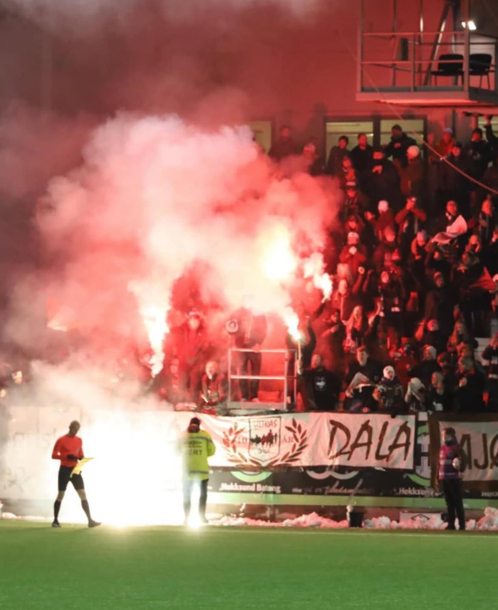 NorwayFooty's tweet photo. Mjøndalen vs Jerv

Ultras Dala with a pyro show and banner reading ‘Our flames will never be extinguished’ ahead of their promotion/relegation match, where they won 2-1 including a 90th minute winner. 2nd leg on Saturday.

Ultras Dala https://t.co/ynsF0A52oQ