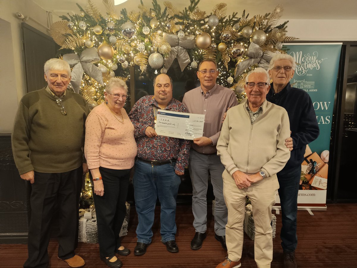 President Jamie and the Rotarians of Eckington and District present a cheque for £400 to the Sheffield Area Kidney Association.