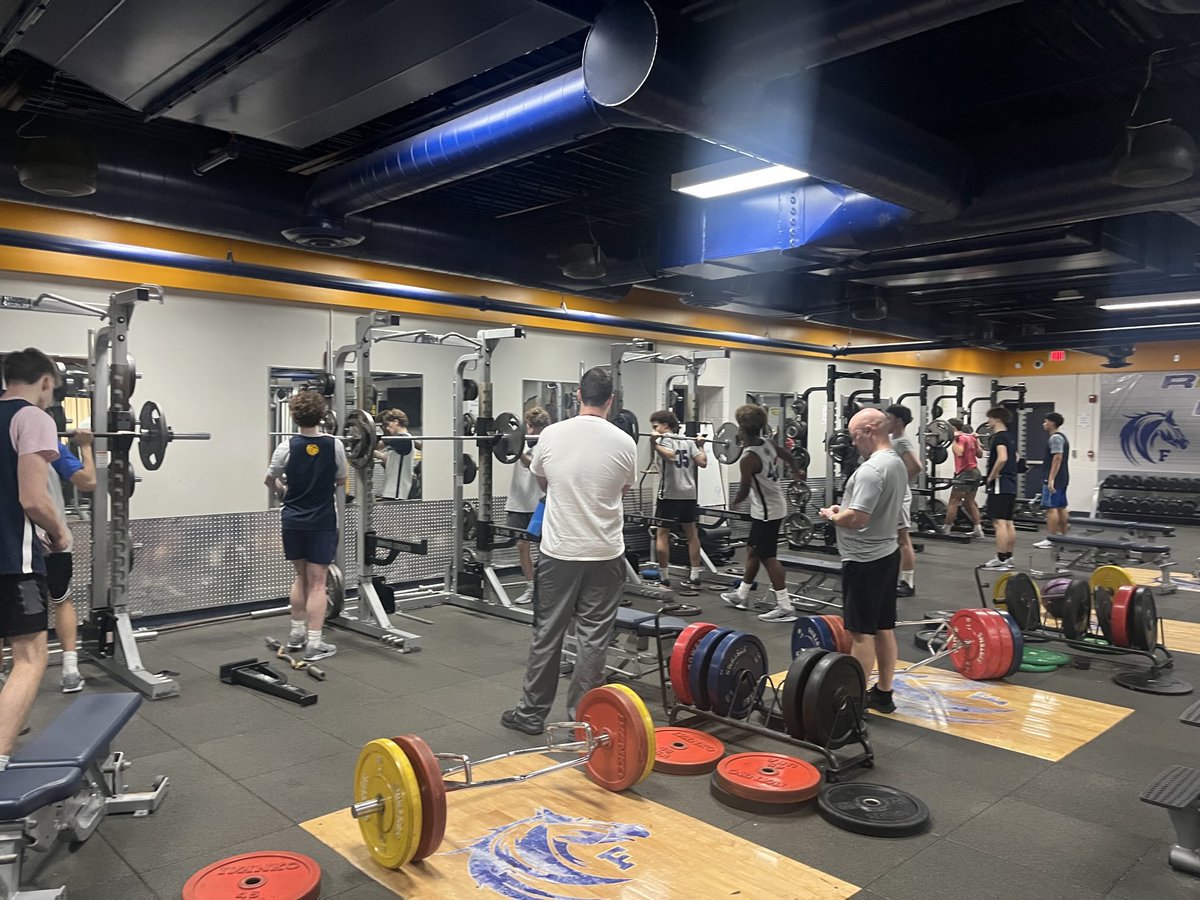 After a morning practice-Strength Coach Tyler Clouse (class of ‘07) putting us through a lift. #strengthandhonor