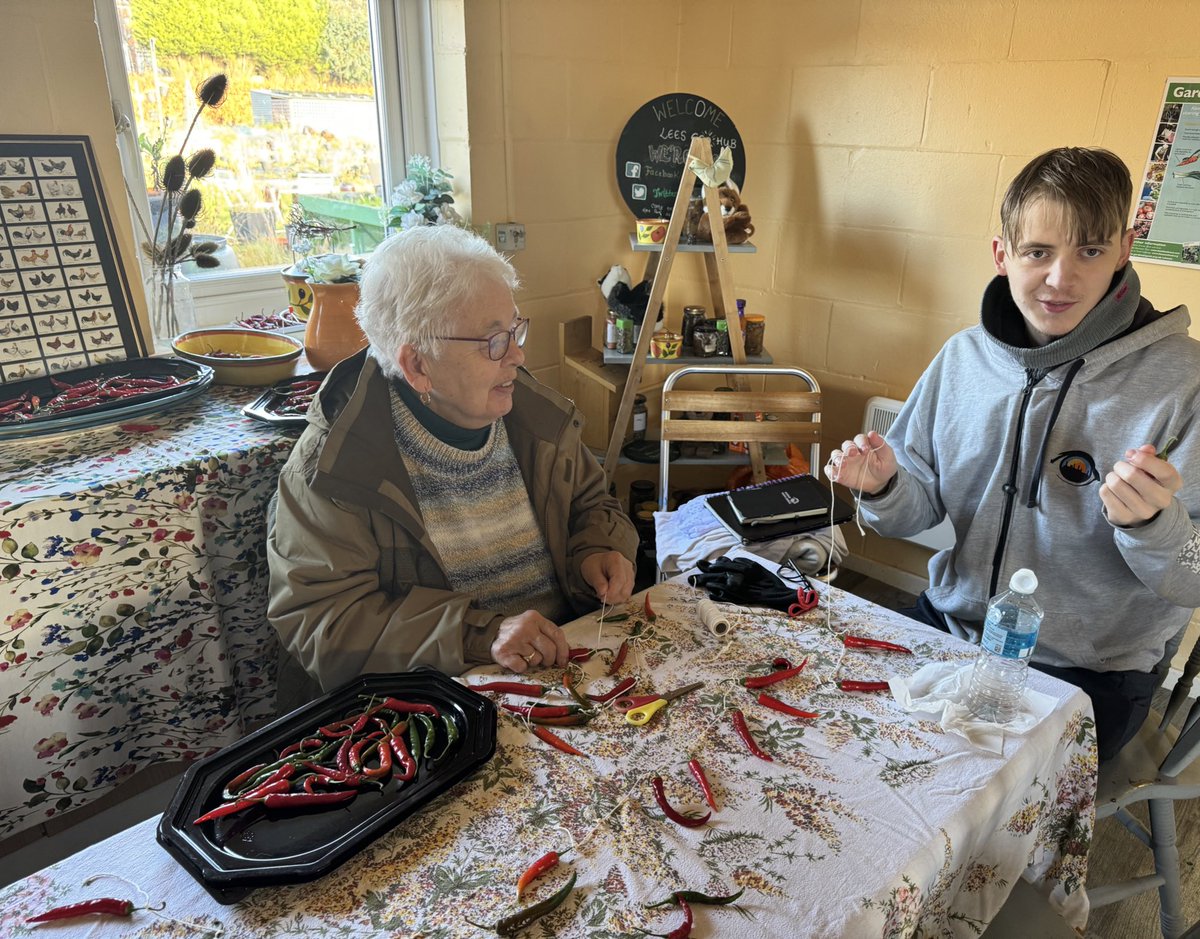 It’s chilli out there! Our team are busy making Chilli bunting while keeping warm at the hub! We aim to dry the chillies out. 
To preserve them, make into chilli flakes, infuse oils and make tasty sauces. #chillies <a href="/StirToAction/">Stir to Action</a> <a href="/Northern_LilyGM/">Victoria - Director at Northern Lily CIC</a> <a href="/GreenerGtrMCR/">Greener Greater Manchester</a> <a href="/WeActTogether/">Action Together</a>