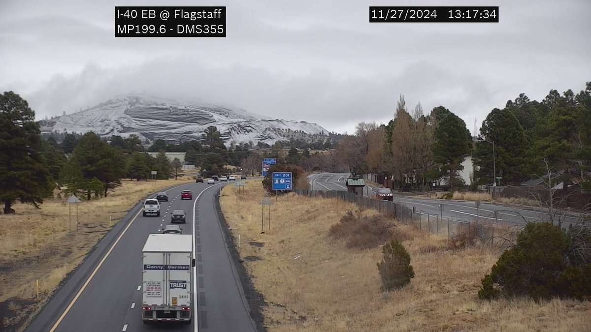 Some snow has fallen on the eastside of Flagstaff, but with temperatures still above freezing, little to no accumulation is expected. Be mindful of reduced visibility from passing showers if traveling. #azwx