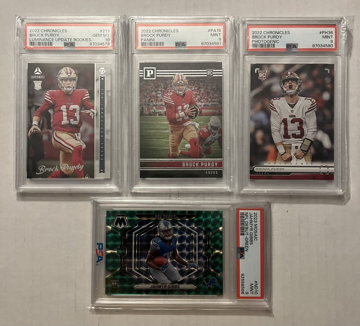 2012CJ's tweet image. ATTENTION! my car was broken into yesterday morning and my backpack stolen. It had a majority of the cards below inside plus some raw. Please LMK if you see them posted anywhere. I’m in Fort Wayne, Indiana. Thanks for any help @CardPurchaser @TheHobby247 @HobbyConnector #thehobby