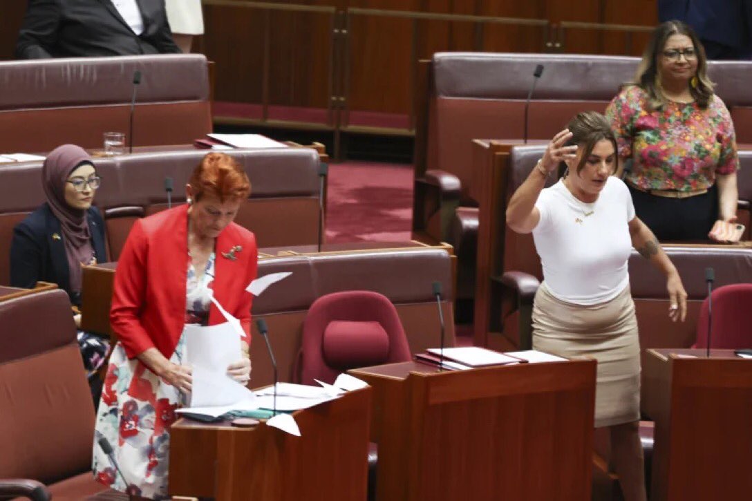 RheenSister's tweet photo. The worst most despicable racists in Australian history in this photo, surrounding one of the greatest freedom fighters in Australian history

We got your back Pauline https://t.co/L0JQGcqTZx