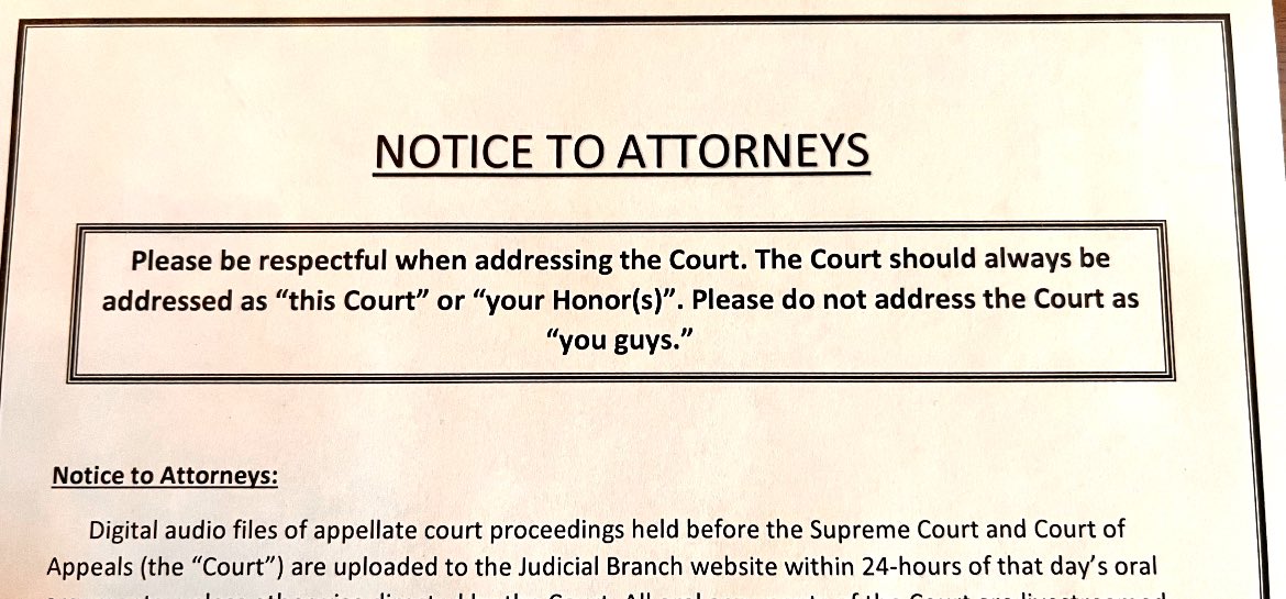 This gem sits under the glass on the counsels’ table at the Nebraska Supreme Court. “Please stop calling us ‘You guys’.”