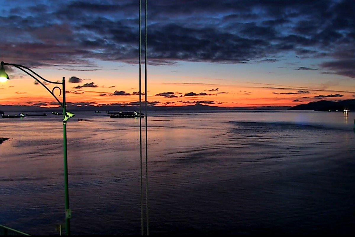 DriveBC's tweet photo. 🌆This afternoon's sunset will likely be the last one we'll see on the South Coast for a few days thanks to increasing cloudiness. So if you missed it, let us share this picture we just took from one of our #LionsGateBridge cameras.
Enjoy and drive safely.
https://t.co/MNovn5KGvc https://t.co/k3D34RxnWF