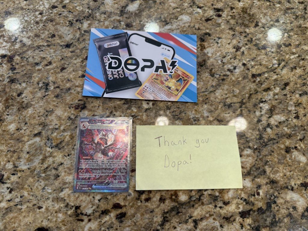 PrazmaMike's tweet photo. Finally got the charizard from paldean fates thanks to @DOPAcard. Card is in great condition and came quick #dopapulls #dopa https://t.co/qPuVddl28j