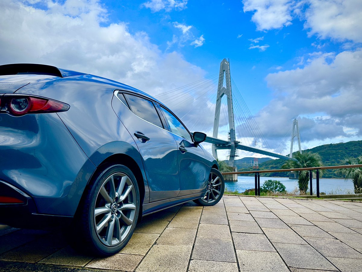 tarourakami's tweet photo. 酷い風雨になったかと思えば陽が射したり、不安定な天気だ☀️☁️☔
#MAZDA3 #mazda3hatchback
#大島大橋 https://t.co/2Uht7iOeRw
