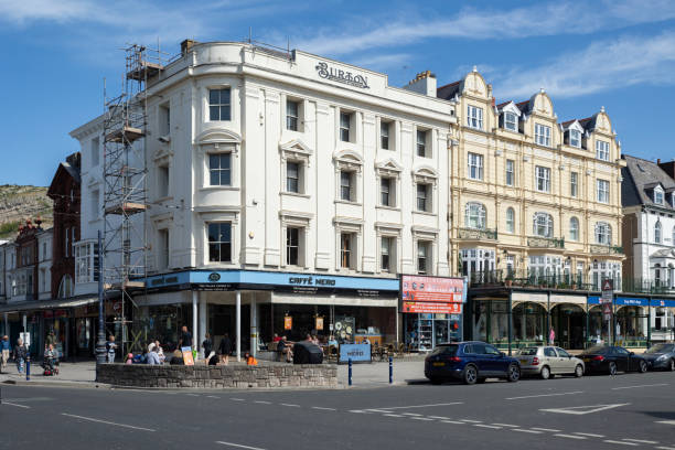 Llandudno, often referred to as the "Queen of the Welsh Resorts," boasts a charming high street that reflects the town's rich Victorian heritage. The high street is a vibrant blend of traditional and modern, lined with an array of shops, cafes, and eateries that cater to both