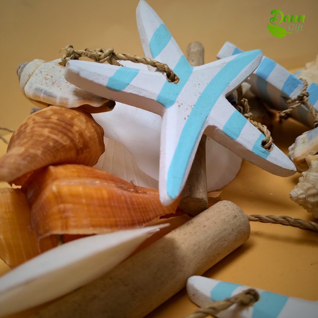 daungift's tweet image. Bring the ocean indoors with these beautiful shells and wood hanging decorations!  Natural, timeless, and perfect for creating coastal vibes your customers will love. Available for wholesale—let the seaside style set sail!  #BeachHouseDecor #ShellCraft #Wholesale #DaunGift