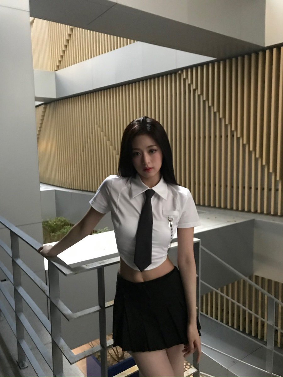 This set is something else. Kinda matches the vibe of my outfit today, don’t you think? Always a bit surreal being here, like I am living in two worlds at once. But that’s showbiz for you! Time to refocus and nail this next take. Lights, camera... you know the rest!