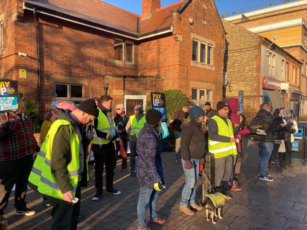 socialistworker's tweet photo. Solidarity with @NEUCambs teachers on the picket line at Hills Road Sixth Form college in Cambridge this morning fighting for fair pay 🔥

#PayUpNow @NEUnion https://t.co/aCv6ys0ACT