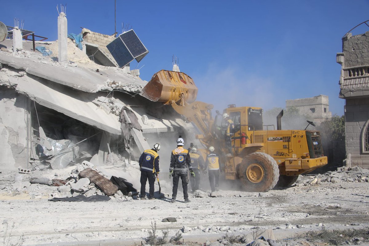 SyriaCivilDef's tweet photo. A massacre was carried out by Syrian-Russian aircraft, which targeted residential neighborhoods and commercial shops in the city of Atarib, west of #Aleppo, today, Thursday, November 28.
The attack killed 14 civilians, including 3 children and 2 women, and injured 5 civilians, including 2 children.
Our teams worked to recover the victims' bodies from under the rubble, provide medical aid to the injured, extinguish a fire caused by the shelling, and assess the damage in the targeted areas.
#WhiteHelmets #Syria