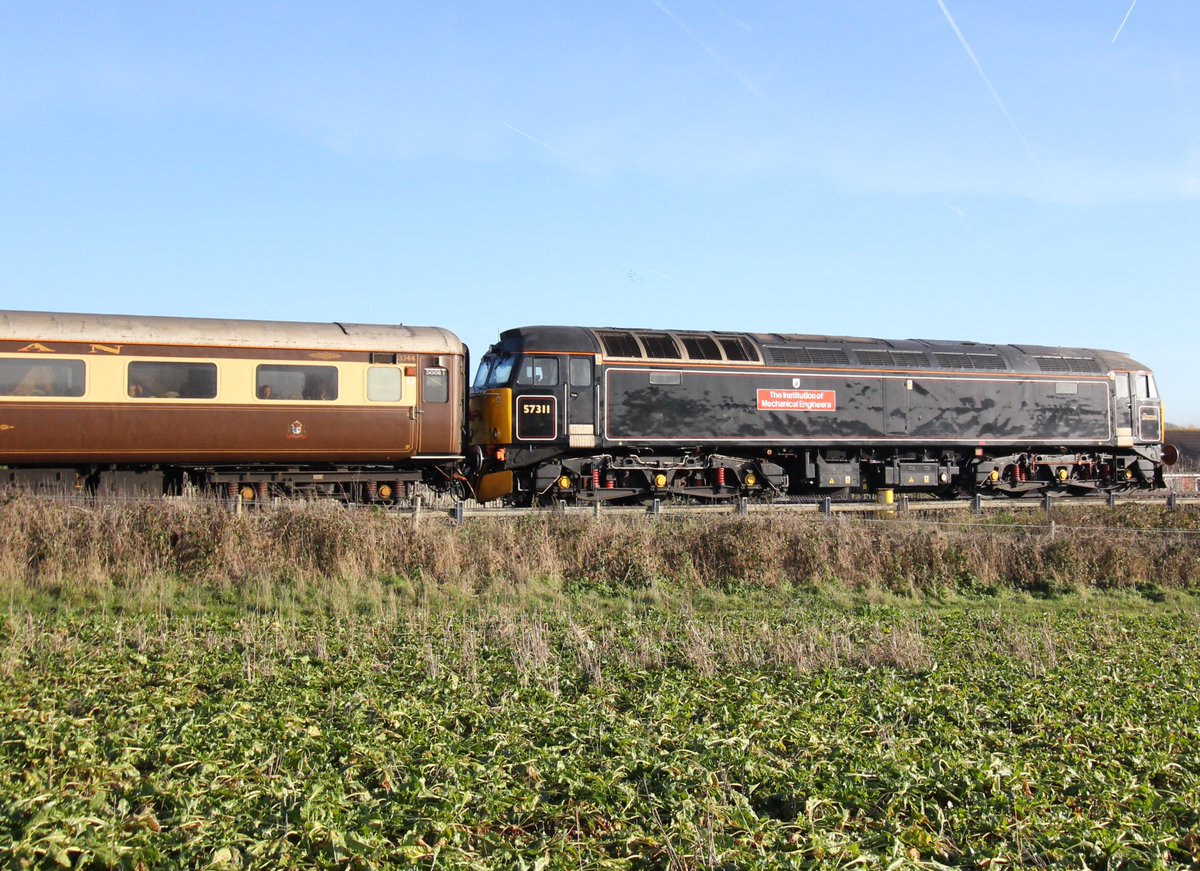 RickScott60's tweet photo. London Kings Cross to York 'Christmas Market' special, passes Heighington on the old GNGE joint today, in the hands of 34046 'Braunston' and 57311 at the rear. https://t.co/iKVpj1DI8B
