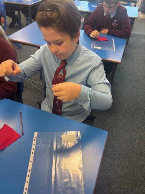 St_Andrew_Apost's tweet photo. Y6 practising those sewing skills in preparation for making our Christmas tree decoration as part of our design technology topic. #successfulsata #readytolearnnw https://t.co/SGyc9xn9pe
