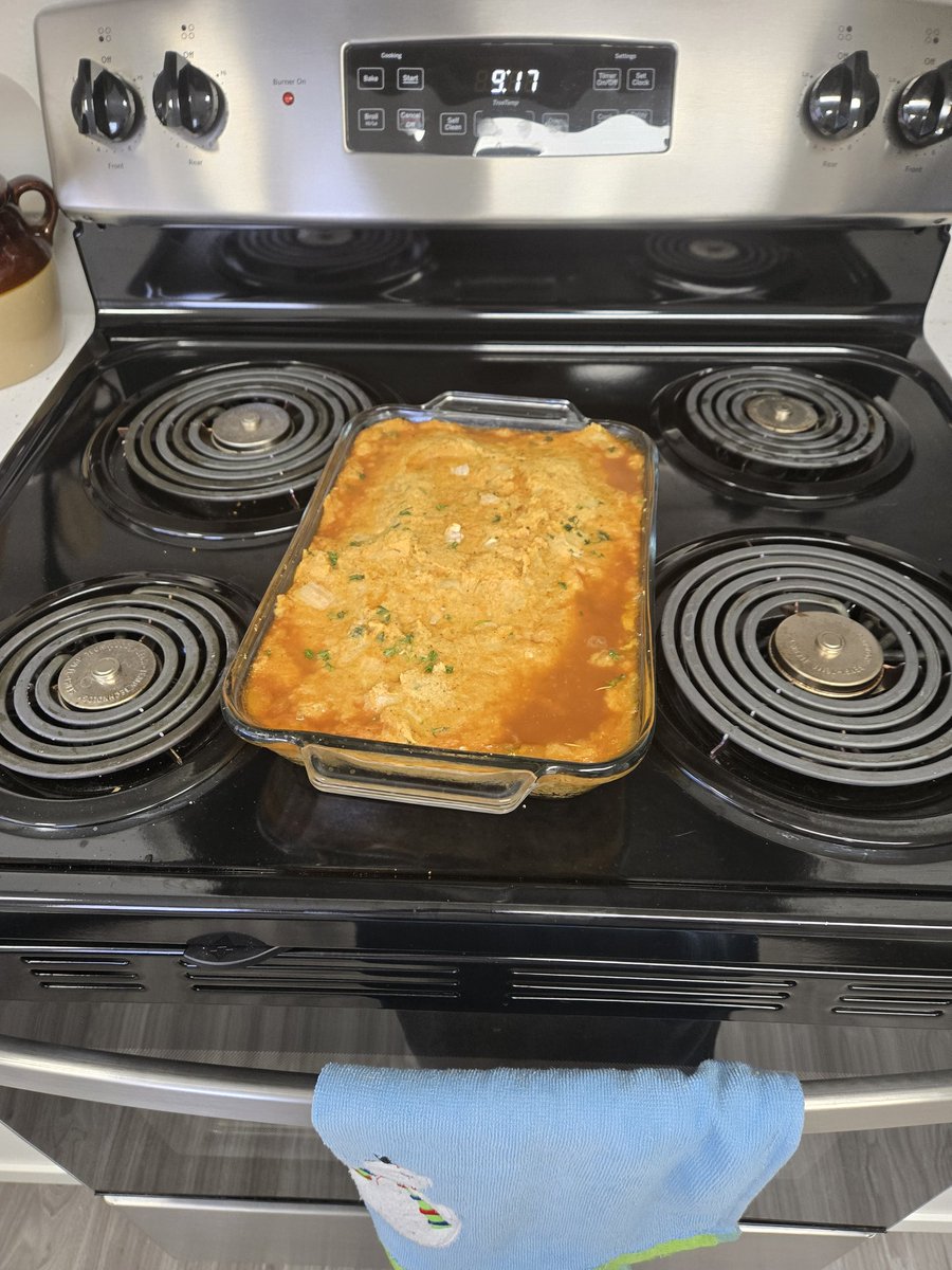 Homemade stuffing out of the oven before 9:30. It helps when you have Thin Lizzy - Live and Dangerous blasting. Happy turkey day!