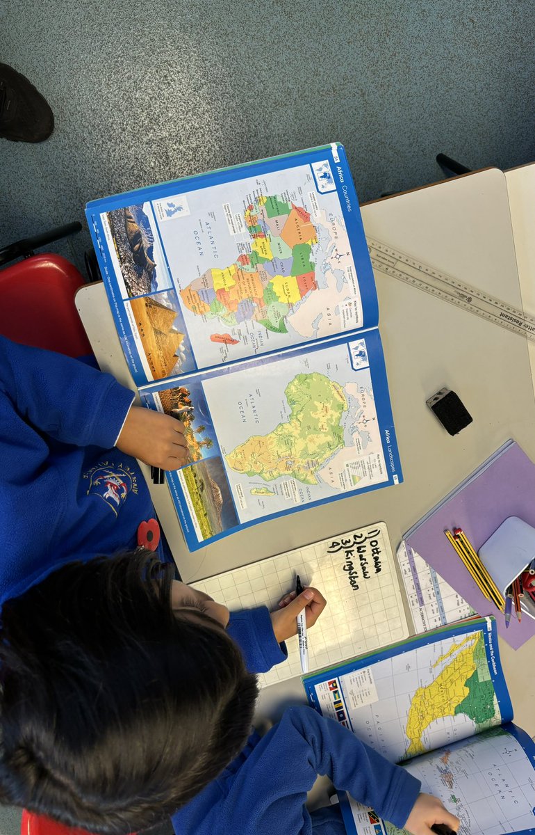 latimerprimary's tweet image. #ClassMN learnt how to use an atlas this morning to answer questions about the Earth and beyond! They found out the names of different capital cities, facts about the UK and even the order of the planets in our solar system. 🌎🇬🇧🗺️#LatimerGeography #Year2