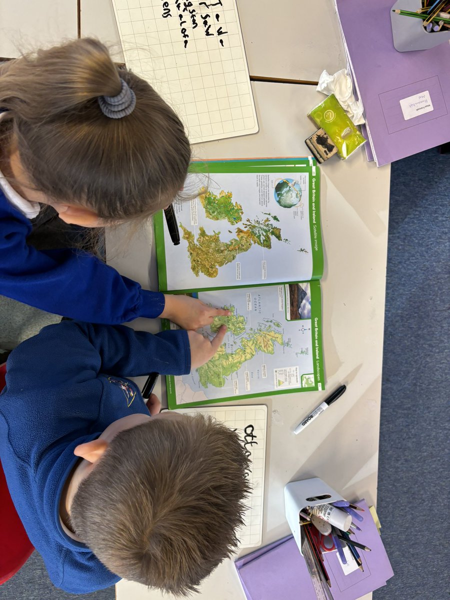 latimerprimary's tweet image. #ClassMN learnt how to use an atlas this morning to answer questions about the Earth and beyond! They found out the names of different capital cities, facts about the UK and even the order of the planets in our solar system. 🌎🇬🇧🗺️#LatimerGeography #Year2