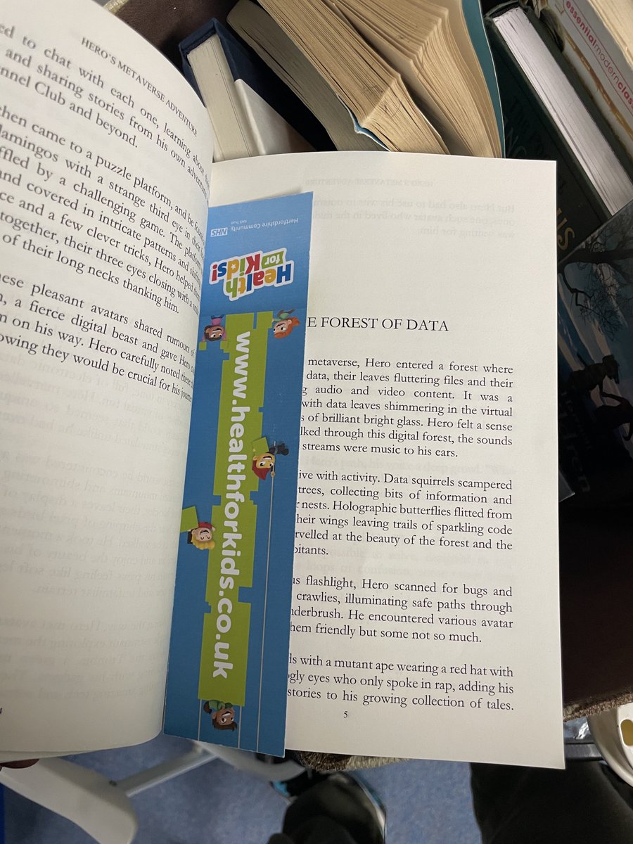 We had Parent’s Evening at my son’s primary school tonight &amp; it was so great to see my Made By Apes children’s book Hero’s Metaverse Adventure still being actively read by the kids in the classroom.

And before you ask, <a href="/herothedoggo/">Hero The Doggo 🍌</a> is a proud OG Alum of the ‘Starbooks Wall of