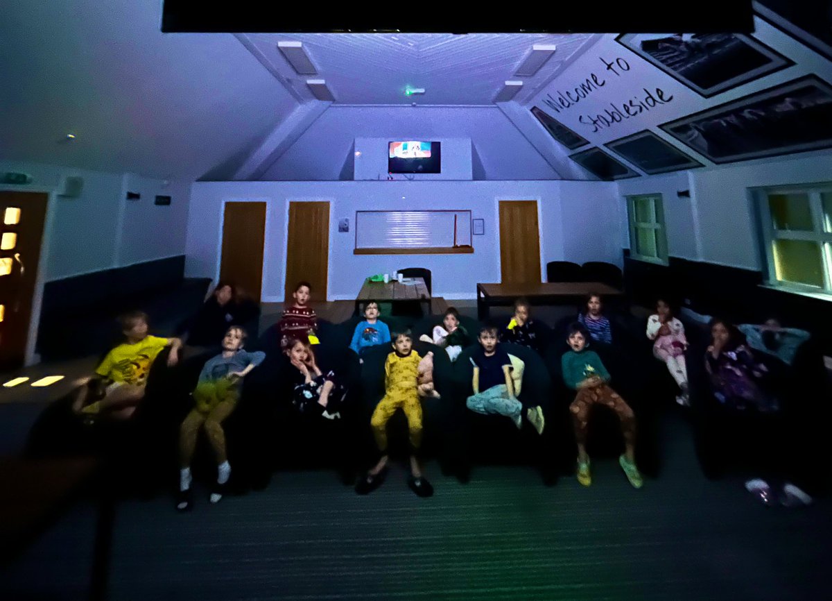After a really busy day, year 2 are settled down for a movie before bedtime.